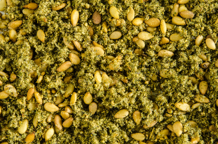 Dry hyssop leaves and seeds. Food background. Closeup macro shot. Top view.の写真素材