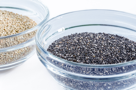 Quinoa and chia seed in a glass bowl isolated on white background. Closeup shot. Healthy food concept.の写真素材