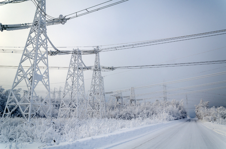 High voltage power lines in the winter.の写真素材