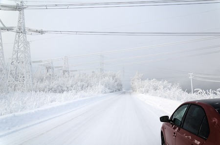 High voltage power lines in the winter.の写真素材