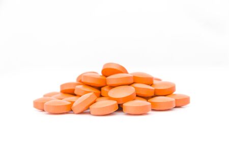 Medical pills placed on rotating table, shot with white seamlessの写真素材