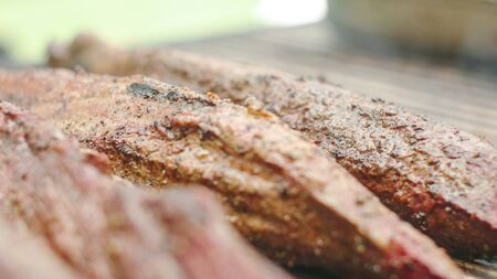 Few pieces of sirloin meat on the grillの写真素材