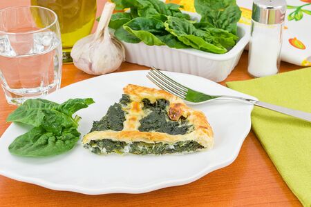 slice of pie with spinachの写真素材