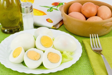 boiled eggs with shell and openの写真素材