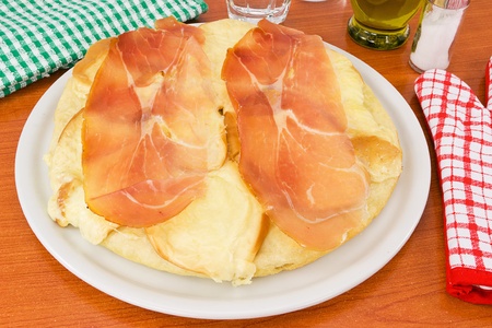 pizza with ham and smoked cheeseの写真素材