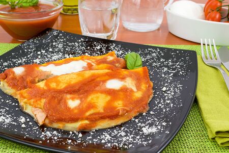 pancake stuffed with sauceの写真素材