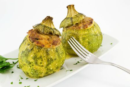 zucchini stuffed with meat の写真素材