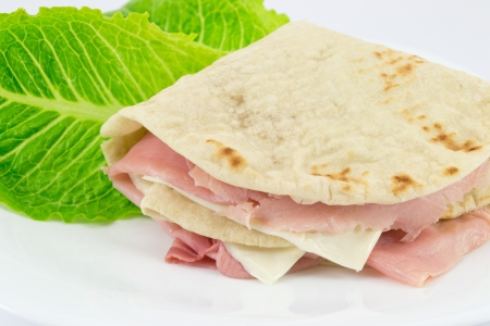 flat bread with ham and cheese slicesの写真素材