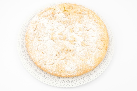 Grandma s cake, with cream and pine nutsの写真素材