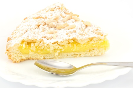 Grandma s cake, with cream and pine nutsの写真素材