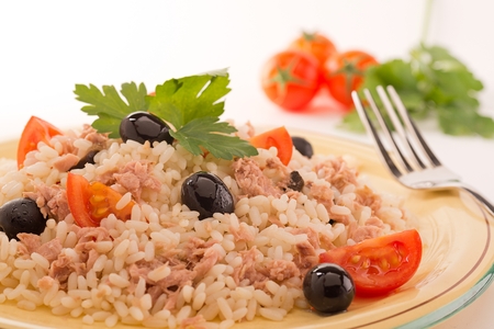 rice with tuna, tomatoes and black olives の写真素材
