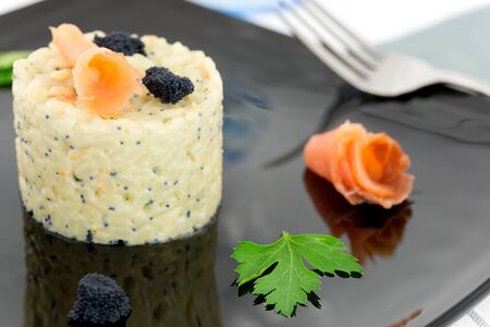 rice with salmon and caviar の写真素材