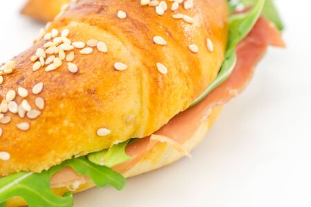 savory croissant with ham and rocketの写真素材