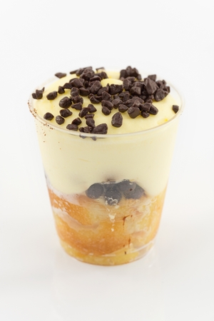 dessert with custard and chocolate chipsの写真素材