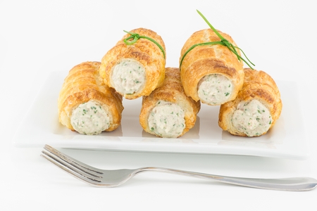 Puff pastry with ham mousse and arugulaの写真素材