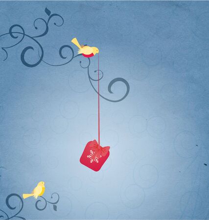 vintage christmas  bird with gift on the treeの写真素材