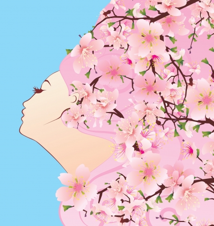 beauty girl profile with spring blossoming hair cherry flowersの写真素材