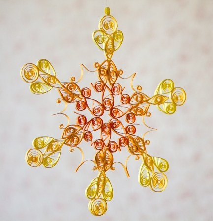 Beautiful paper snowflake, on white backgroundの写真素材