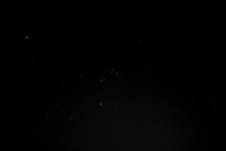Night sky with Orion Constellation. Star gazing