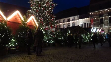 People Visiting a Christmas Market at Nightのeditorial素材