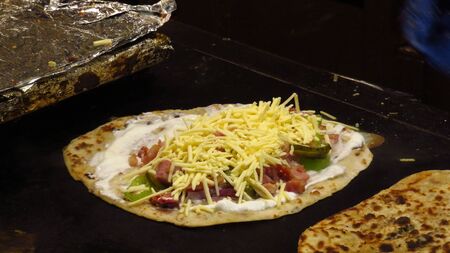 Traditional Hungarian Langos With Cheese Toppingの写真素材