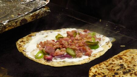 Traditional Hungarian Langos with Toppingsの写真素材