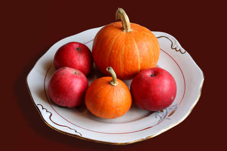 Plate with the vegetables and the fruitsの写真素材