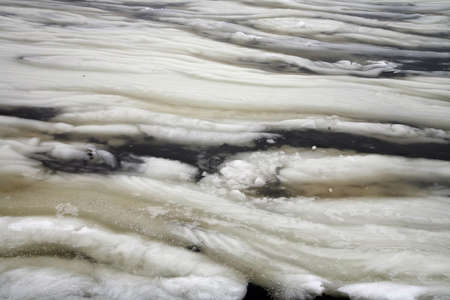 Icy ornament on the riverの写真素材