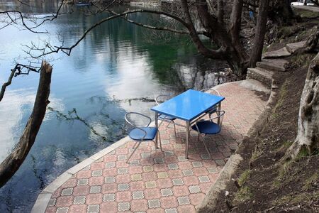 Cafe ashore the Blue lake in the mountains of Caucasusの写真素材