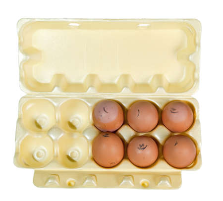 Chicken eggs in packing on a white background 
