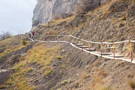 Pedestrian path on a mountain along with the coast of sea