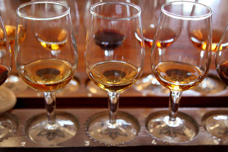 Tasting. Wine is in tall wine glasses