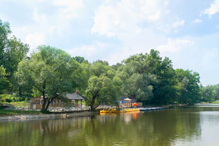 RUSSIA, MOSCOW - May 28,2014: Exhibition of Achievements of the People's Economy (VDNKh). Lake shore and boat station at the exhibition centerのeditorial素材