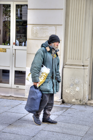 FRANCE, PARIS - April 30.2014: Homeless beggar man on a city streetのeditorial素材