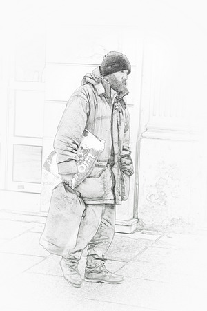 FRANCE, PARIS - April 30.2014: Homeless beggar man on a city streetのeditorial素材