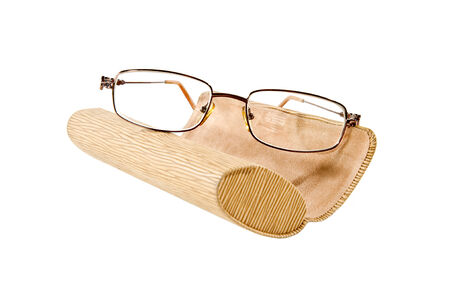 Modern glasses and leather eyeglass case isolated on white backgroundの写真素材