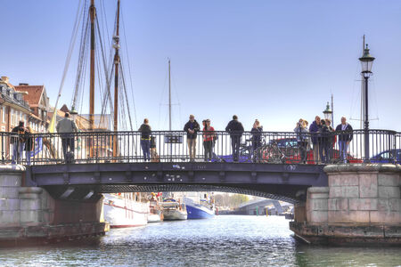 DENMARK, COPENHAGEN - May 02.2013: Bridge through a channel in city のeditorial素材