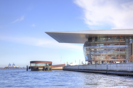 DENMARK, COPENHAGEN - May 02.2013: Large modern opera theater ashore channel in city Copenhagenのeditorial素材