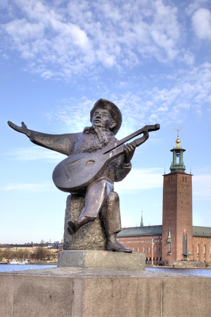SWEDEN, STOCKHOLM - May 04.2013: Sculpture of musician on the embankment of lake of Malarenのeditorial素材