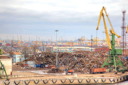 RUSSIA, SAINT PETERSBURG - April 27.2013: Enormous heap of scrapmetal ashore in portのeditorial素材