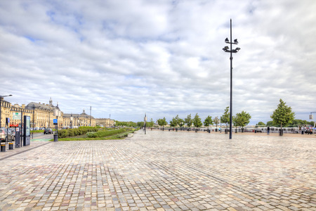 FRANCE, BORDEAUX - May 01. 2014: Square with flowerbed on the embankment of the river Garonneのeditorial素材