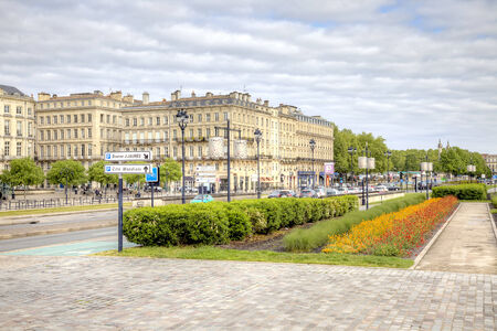 FRANCE, BORDEAUX - May 01. 2014: Square with flowerbed on the embankment of the river Garonneのeditorial素材