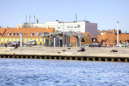 DENMARK, COPENHAGEN - May 03.2013: Picturesque shores along channels in city Copenhagenのeditorial素材