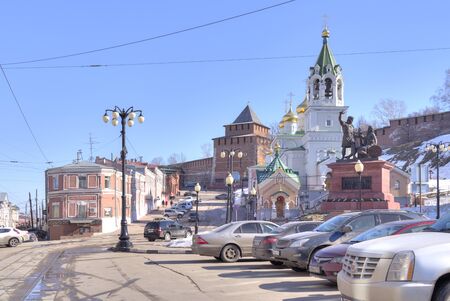 NIZHNY NOVGOROD, RUSSIA - March 14.2015: City landscape. Monument to Minin and Pozharsky, Restored Church,Kremlin and the old merchants housesのeditorial素材