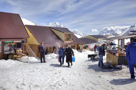 DOMBAY, RUSSIA - May 03.2015: Little tourist accessories market and cafe on the first level of getting up on the mountain Mussa-Achitaraのeditorial素材