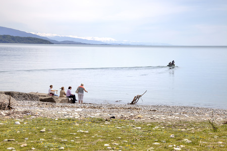 PITSUNDA, ABKHAZIA - May 06.2015: People on a sea-shore in a city-resort Pitsundaのeditorial素材
