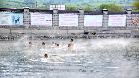 AUSHIGER, RUSSIA - May 02.2015: People swimming in the hot springs with mineral waterÑÐ¾ÑÑÐ¸Ñのeditorial素材
