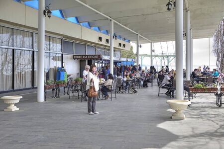 PITSUNDA, CAUCASUS, ABKHAZIA - April 26.2015: Sanatorium-resort complex ashore the Black sea. Embankment of climatic resort. Cafe ashore seaのeditorial素材