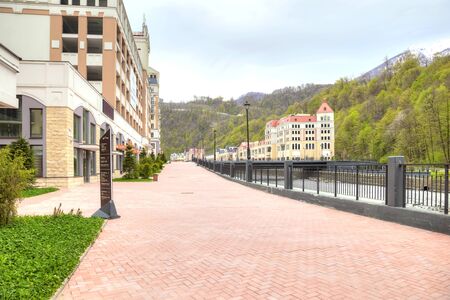 SOCHI, KRASNAYA POLYANA, RUSSIA - April 29.2015: Settlement of municipal type  Krasnaya Polyana and the river Mzymtaのeditorial素材