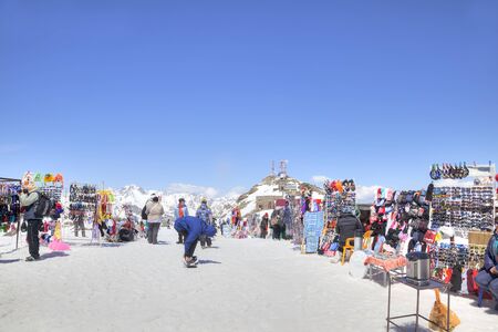 DOMBAY, RUSSIA - May 03.2015: Little tourist accessories market and cafe on the first level of getting up on the mountain Mussa-Achitaraのeditorial素材